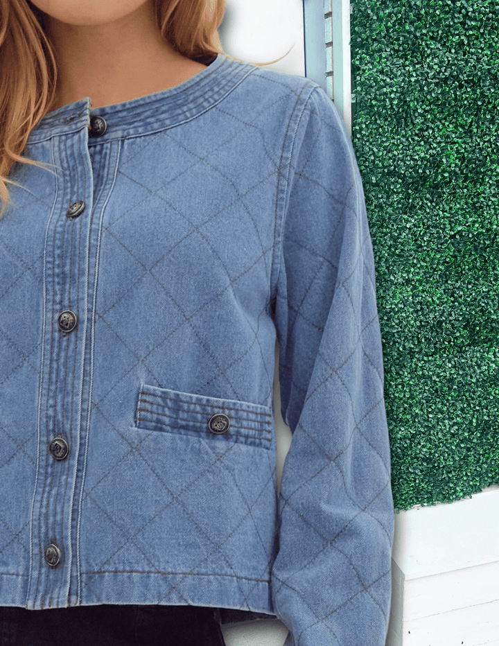 Denim diamond pattern quilted long sleeved crop jacket featuring detailed stitching over welt pockets and neck