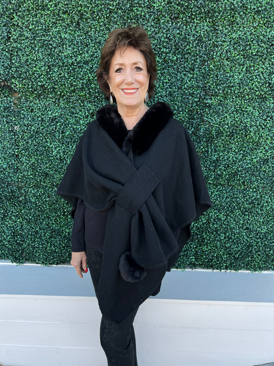 Faux Fur Knit Pull Through Cape with pom pom black