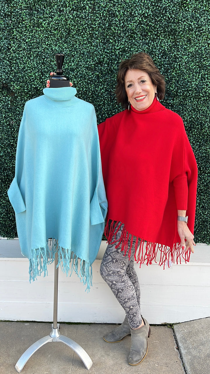 Turtleneck Acrylic Fringe Poncho Sweater baby blue and red with sleeves