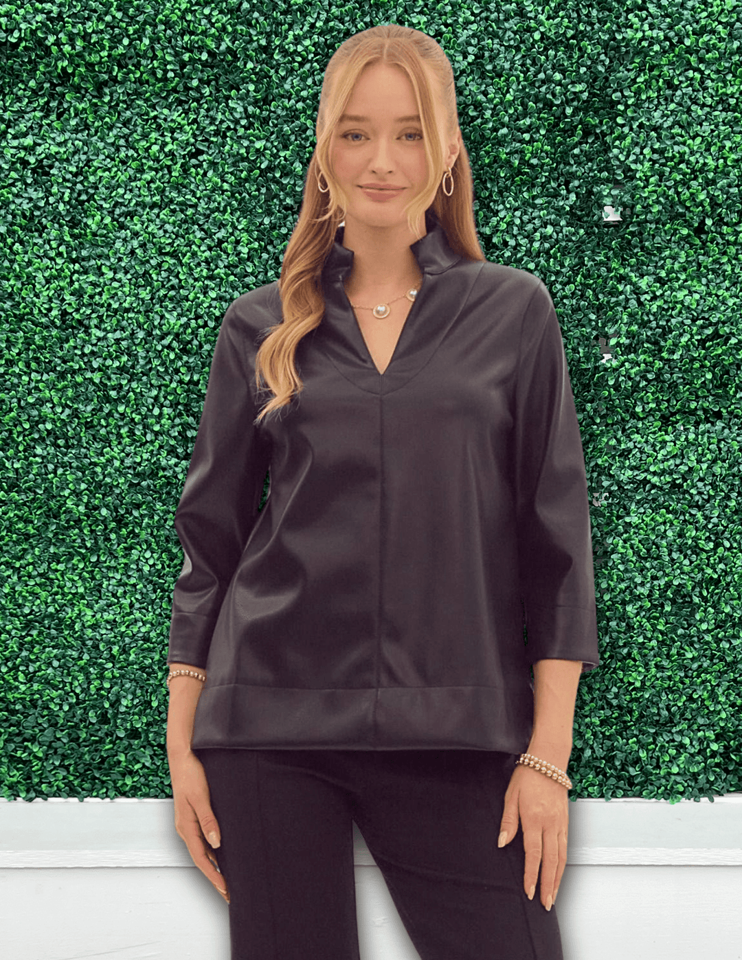 black Faux leather v-neck 3/4 sleeve top featuring slit at sides and cuff entro brand