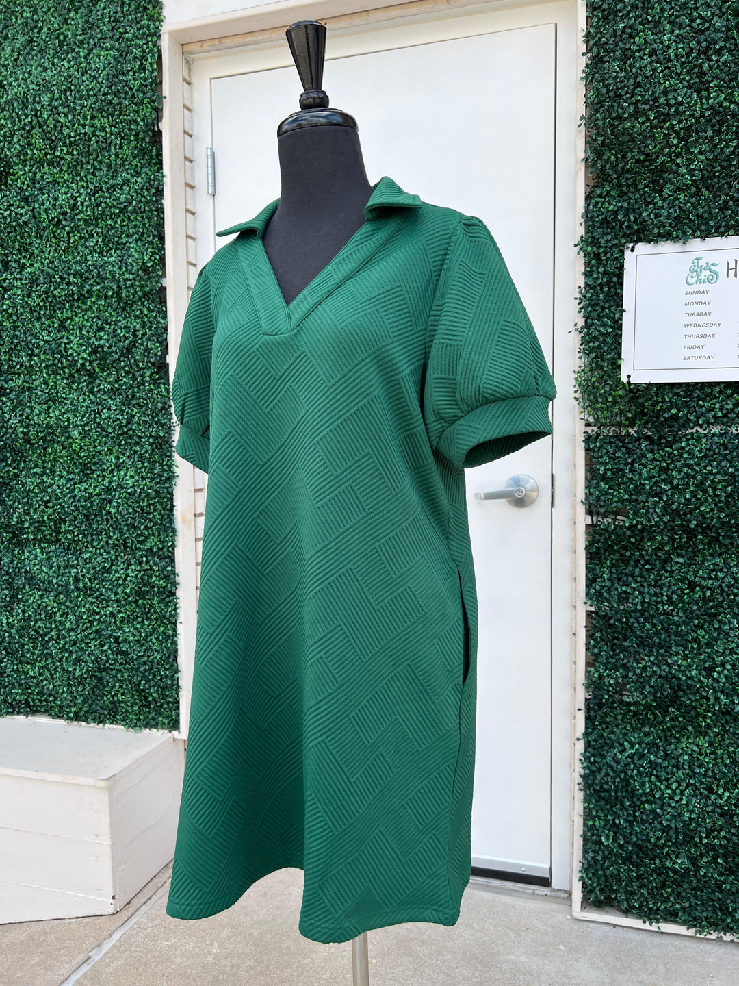 green Textured dress with open collared neck, side pockets, and short peasant sleeve
