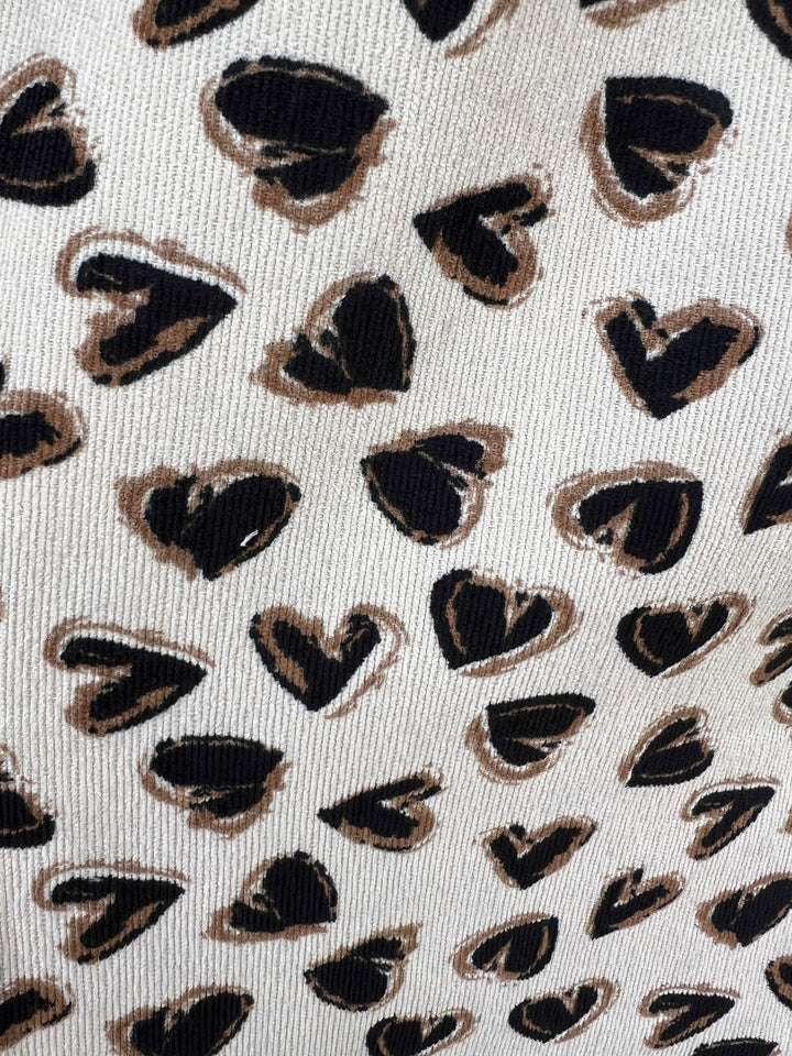 heart print corduroy ruffle hem dress cream fall dresses boutique 2024 tres chic houston drop waist ruffle