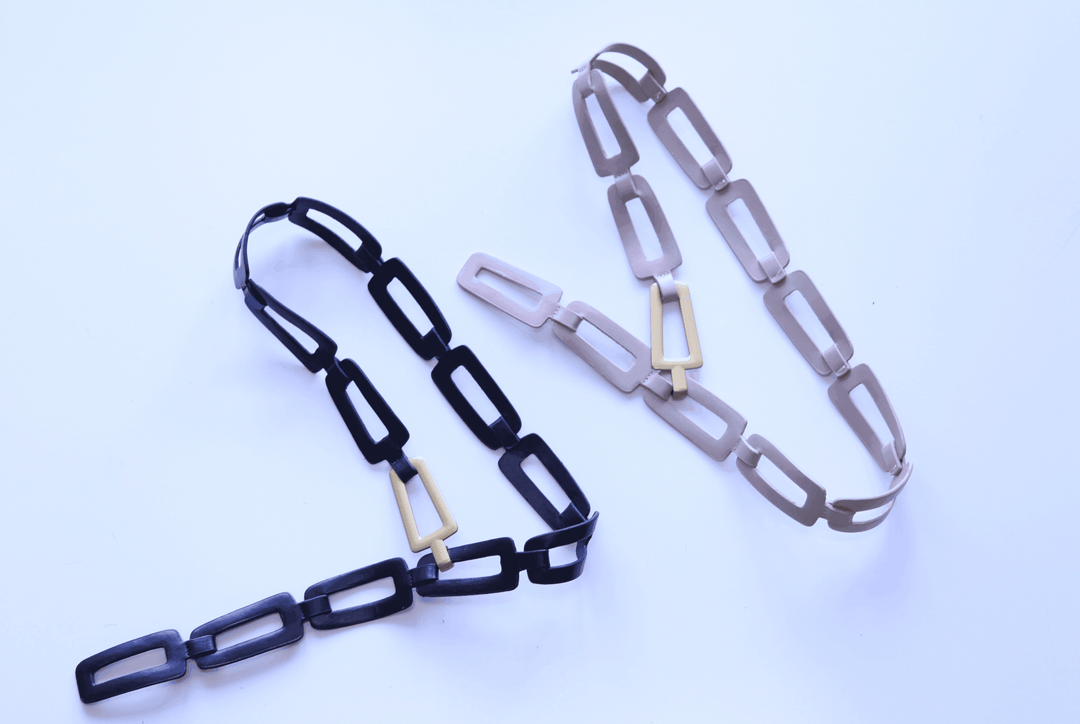 Open link vegan belt with gold hook on Eastside street Houston Texas