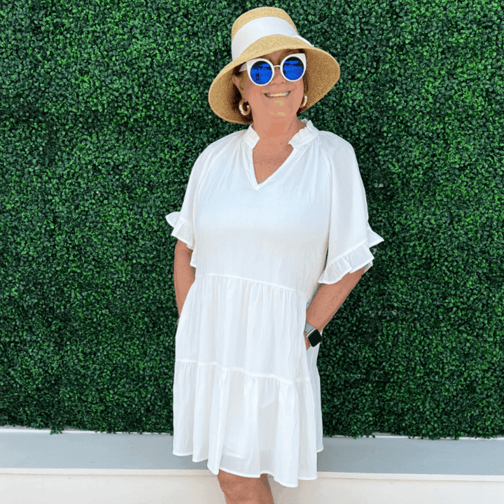 Boutique owner Susan Hancock wearing this light weight summer dress from Tres Chic women&