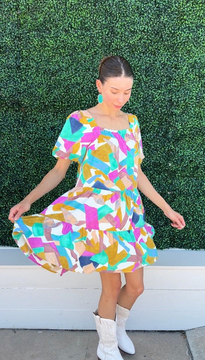 Joy Joy brand fall dress with bright colors square neck and puff sleeves