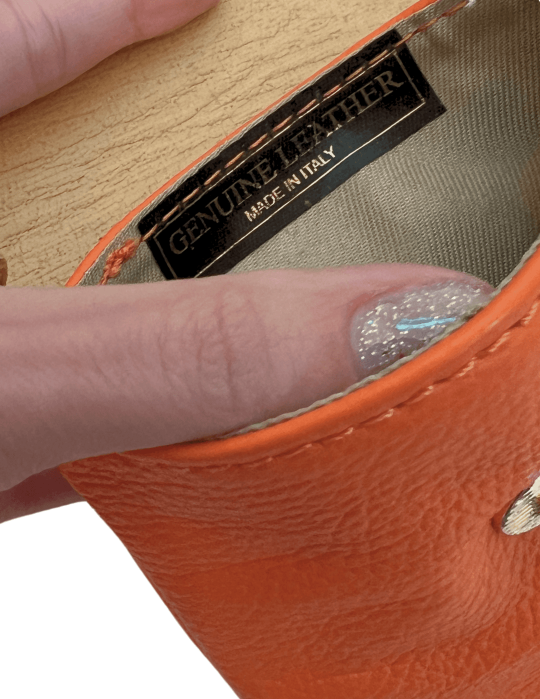 gift boutique near me for women leather phone bee bag orange