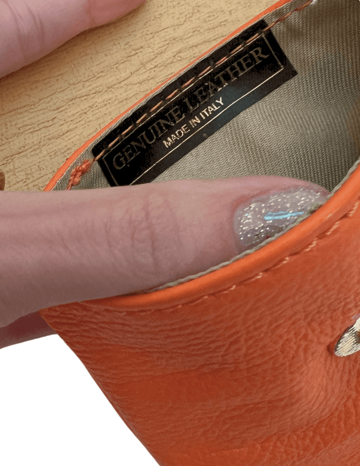 gift boutique near me for women leather phone bee bag orange