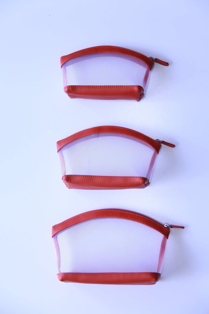 Set of real leather orange and mesh pouch