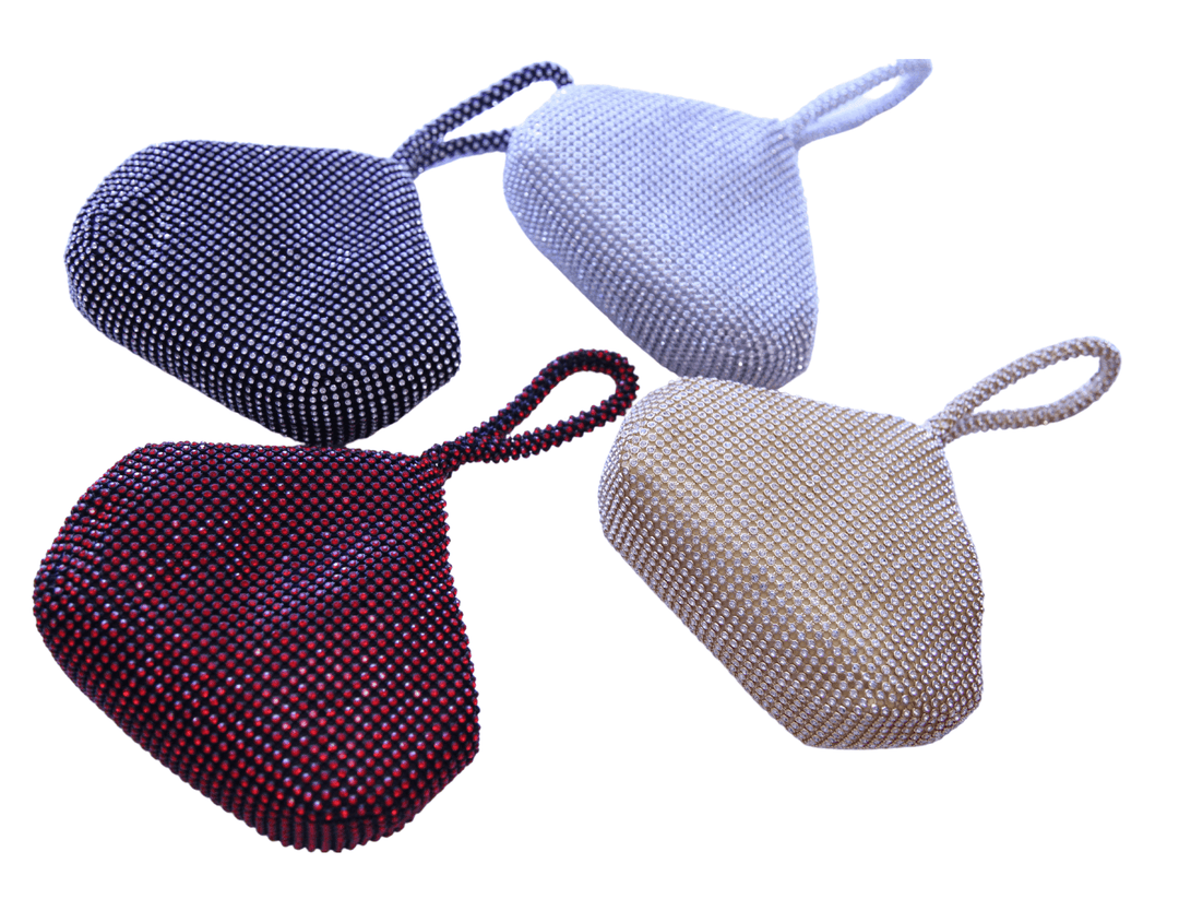 Sparkle and shine at your next formal event with this Tres Chic wristlet