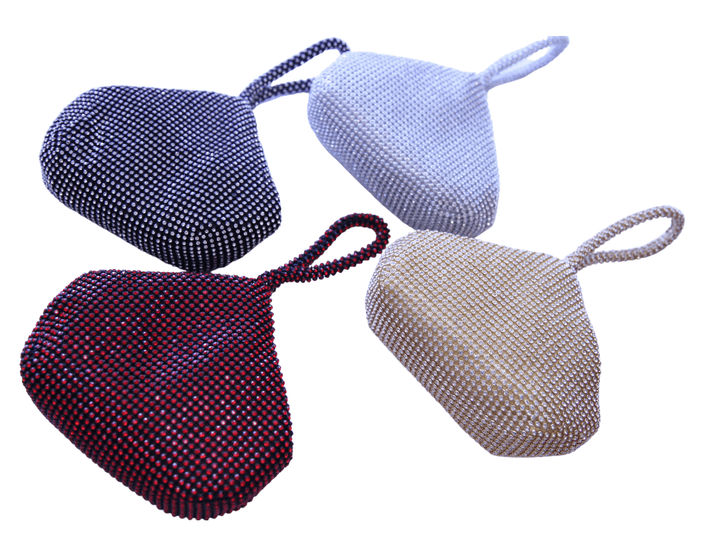 Sparkle and shine at your next formal event with this Tres Chic wristlet