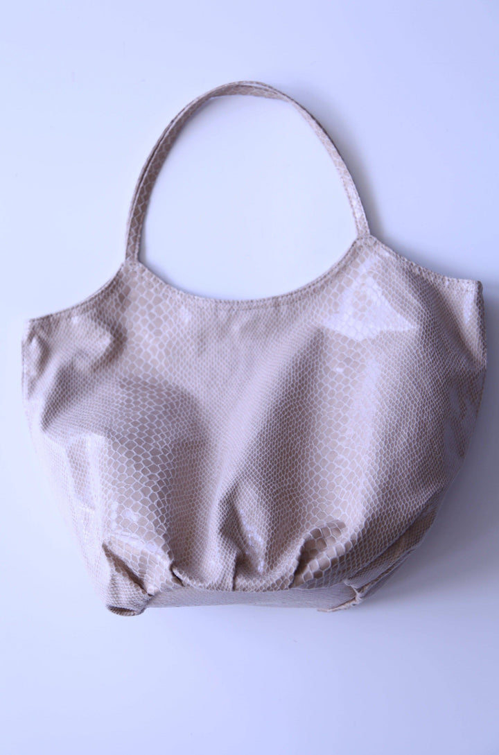 off white hobo bag with snake print- tres chic