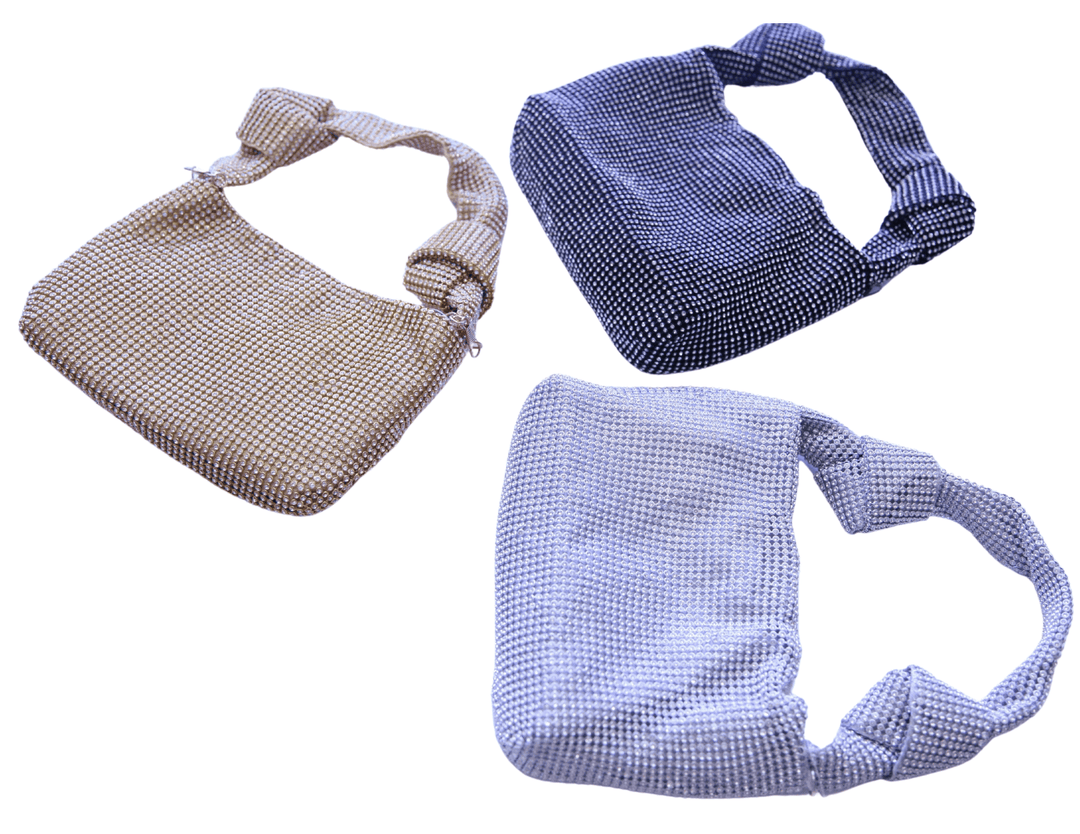 Three different metal colors for studded sparkly handbag at Tres Chic