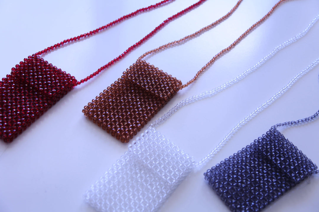 Brown, deep red, dusty blue, and clear phone purse