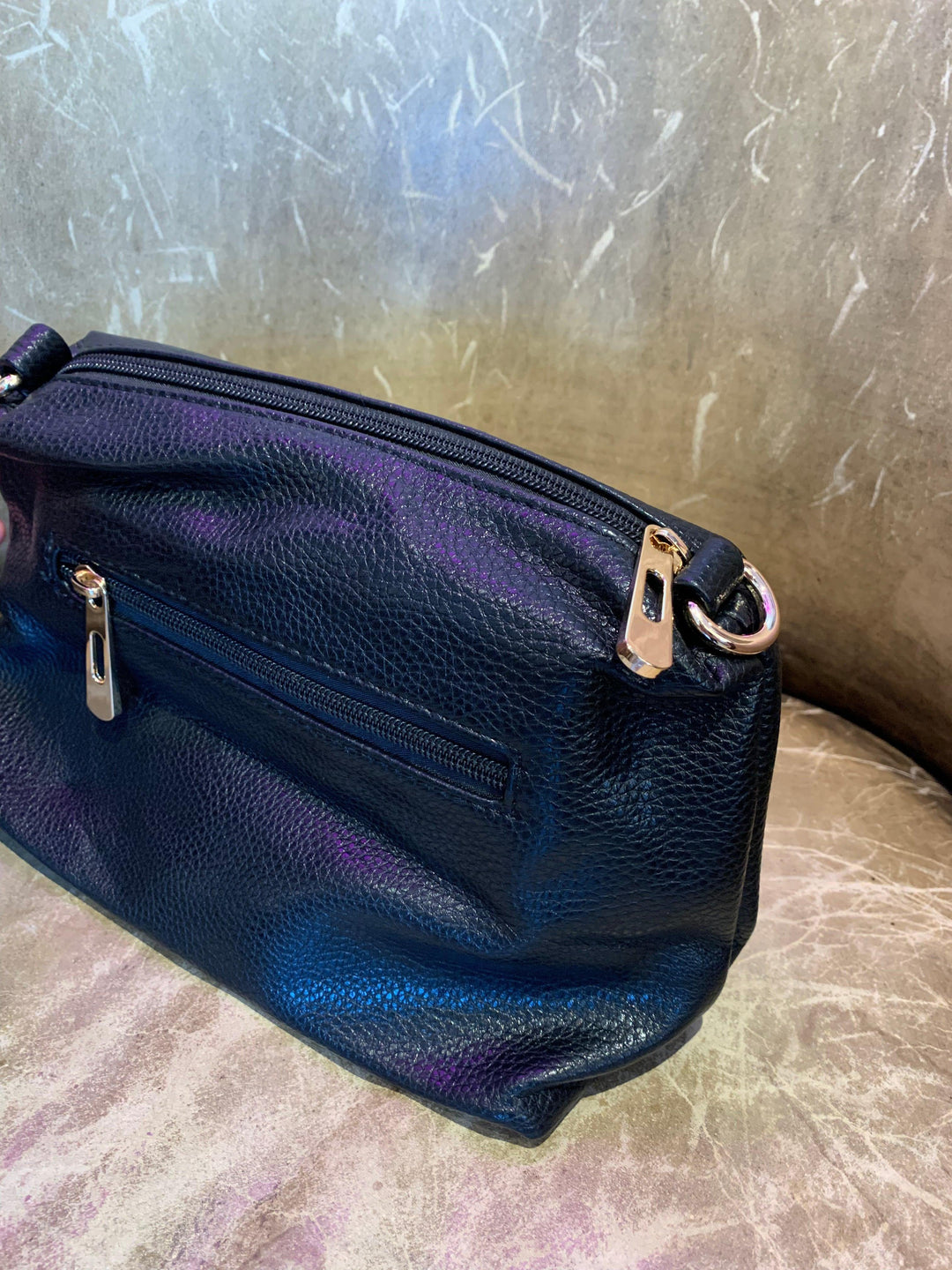 black mini bag inside larger bag at Tres Chic