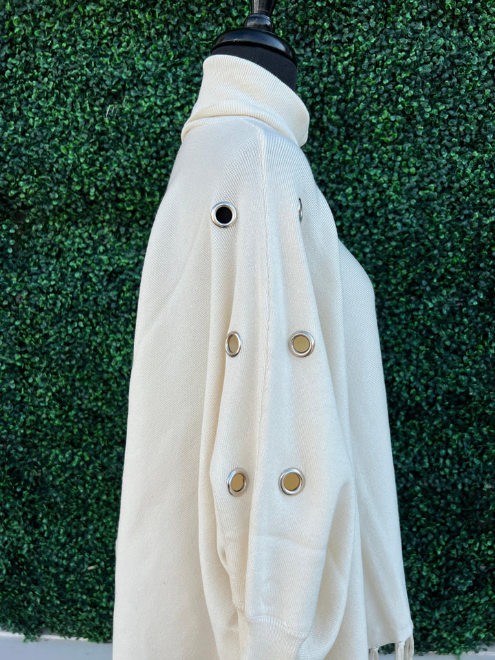 Knit Turtlenck fringed poncho grommets tres chic boutique before you collection cream