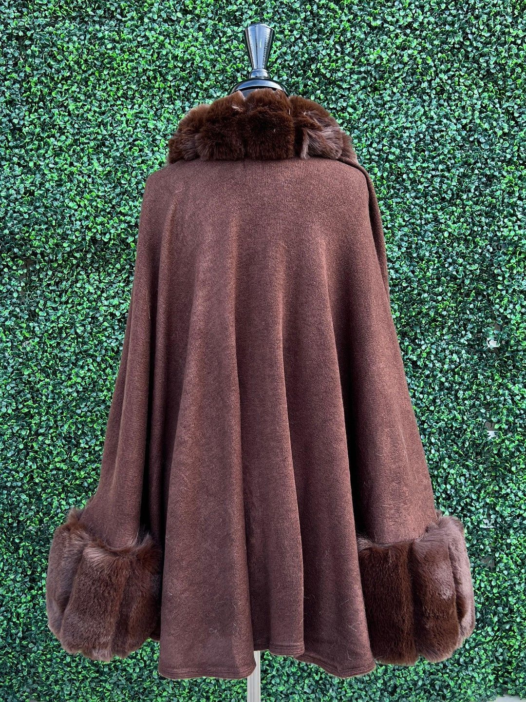 bee clasp handbag and fur coat winter outfit
