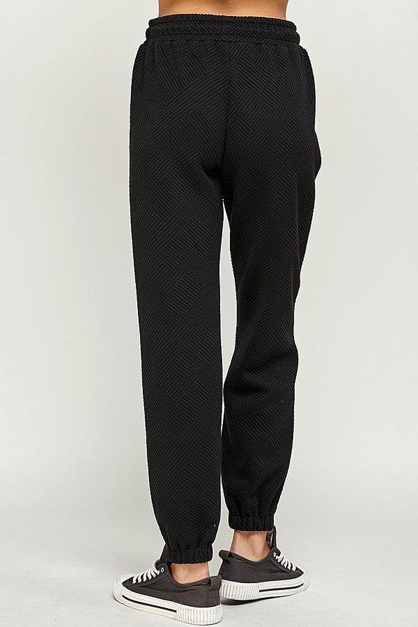 Textured black jogger pants see and be seen 