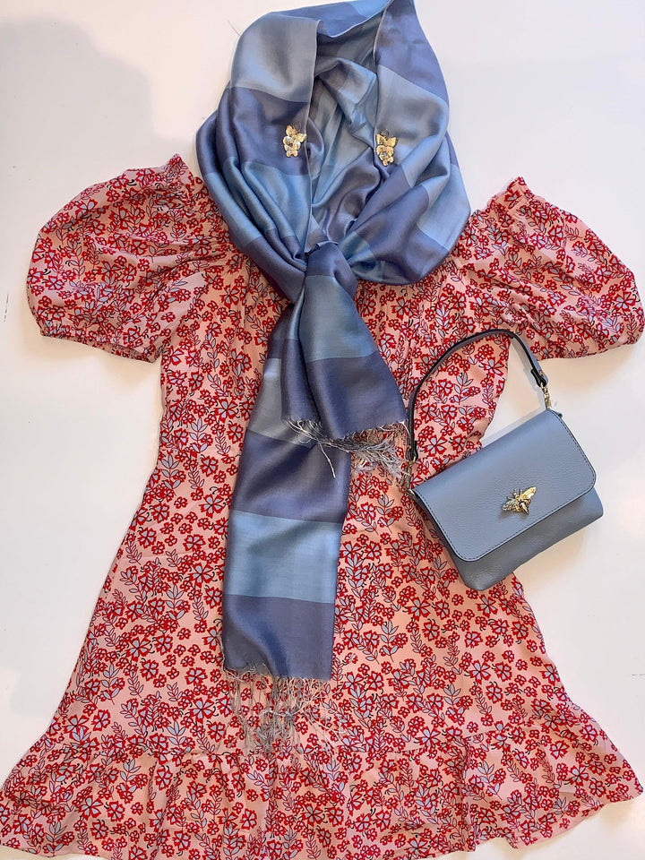 Wear this scarf as a head wrap and so many different ways in the Texas weather