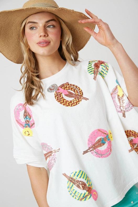 sparkling sequin pool tube embroidery, short sleeves, and a round neck, this oversized cotton tee