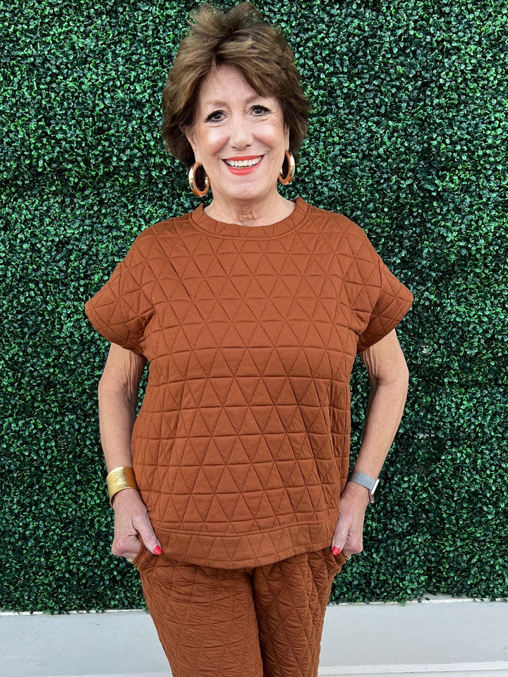 see and be seen quilted sweatshirt top camel womens online boutique trendy