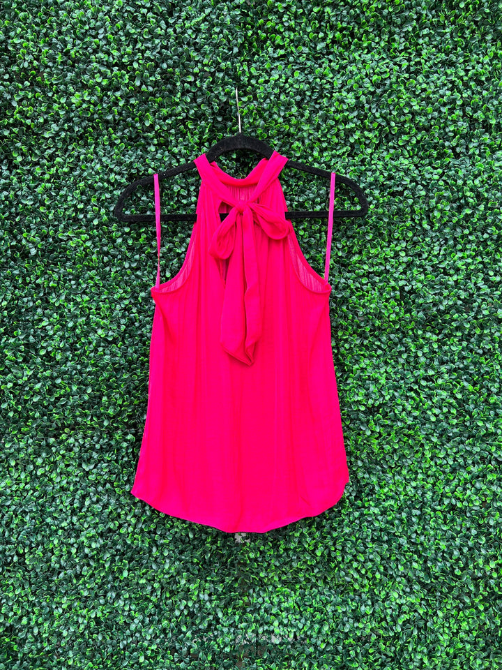 Tres Chic Dress Boutique on Houtson with silky tops can can be worn front and back in hot pink