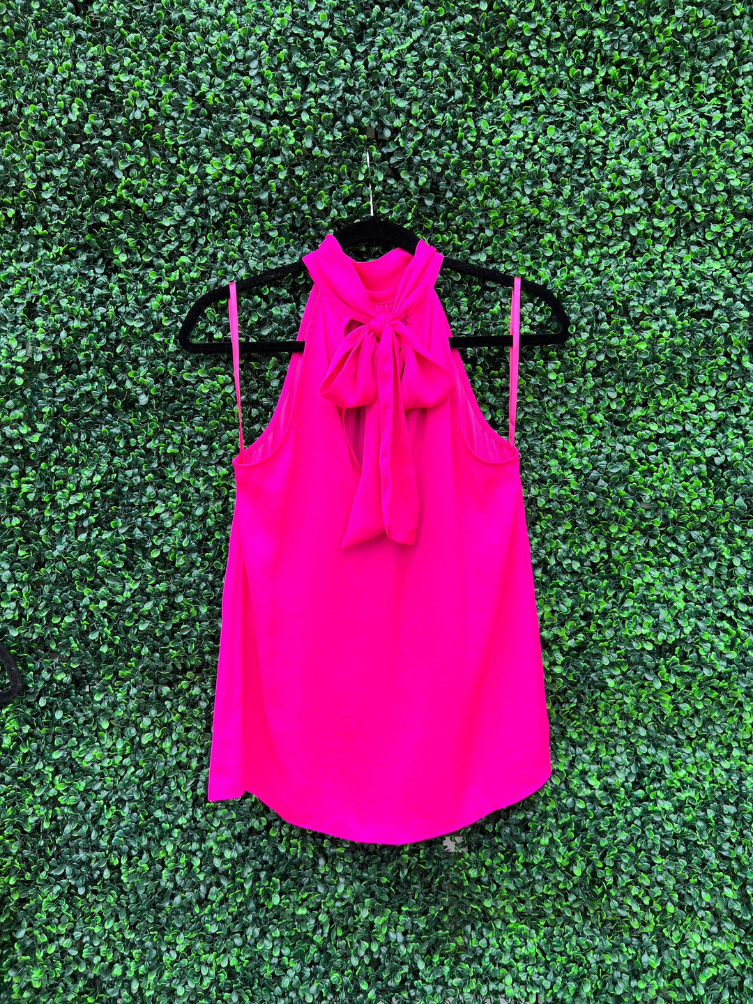 Tres Chic Dress Boutique on Houtson with silky tops can be worn front and back in bright in bright pink