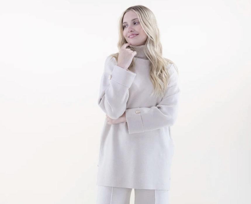 beige Turtleneck Tunic Sweater with gold button detail and silt at sides