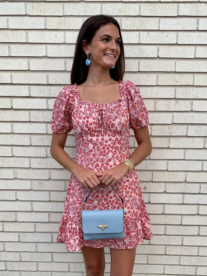Pink dress on a Tres Chic model