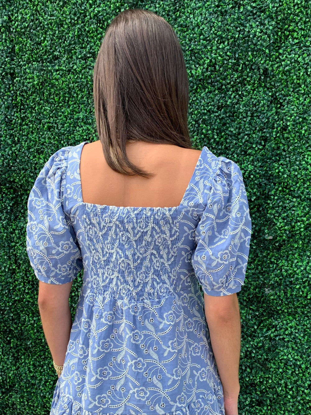 Back of light blue dress in downtown Houston 