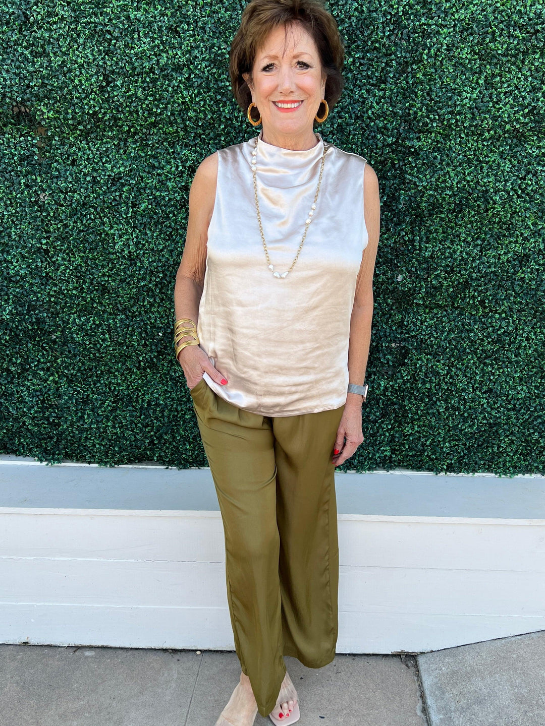 olive green silky satin straight leg pants with pockets at tres chic womens boutique