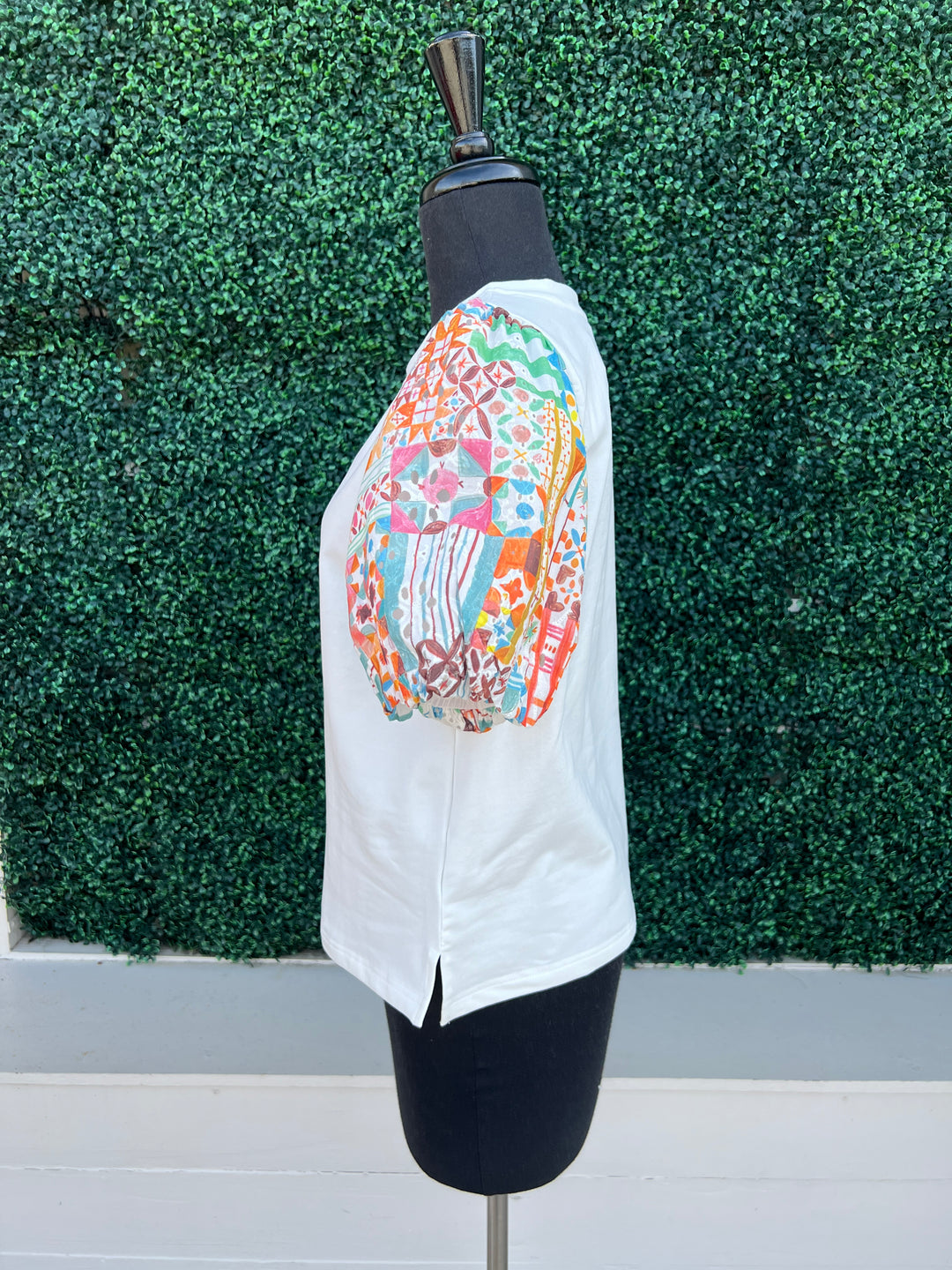 side printed eyelet patchwork contrasting sleeves on white tee joy joy tres chic boutique