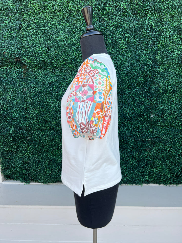 side printed eyelet patchwork contrasting sleeves on white tee joy joy tres chic boutique