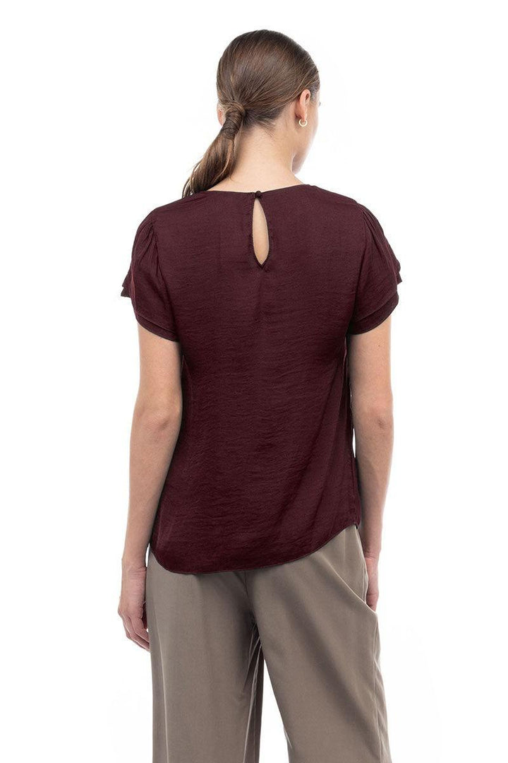 silky burgundy satin blouse by naked zebra with flutter sleeve