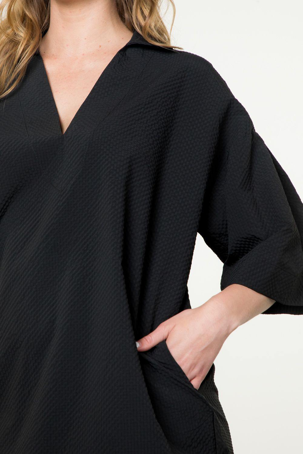 textured v neck dramatic sleeve dress THML brand dresses boutique pleated sleeve with pockets